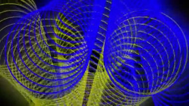 Mavi ve sarı dairelerden oluşan parlak tüneller üç boyutlu uzayda dönüyorlar. Animasyon arka plan ve kulüp videosu. Sonsuz döngü. Döngü