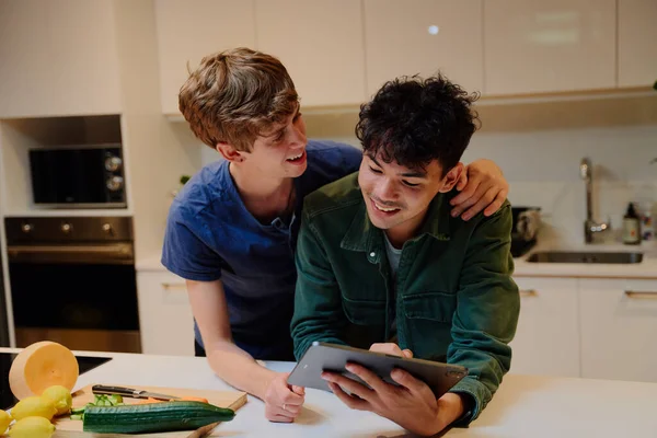 Young Gay Couple Casual Clothing Smiling While Using Digital Tablet — Stock Photo, Image