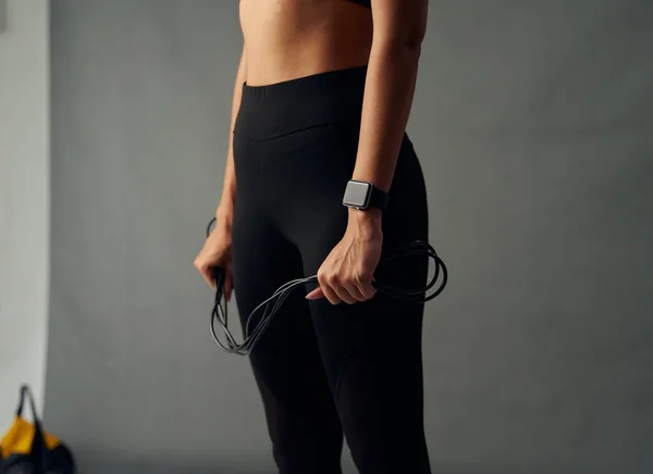 Close Fit Biracial Young Woman Wearing Leggings Fitness Tracker Holding — Zdjęcie stockowe