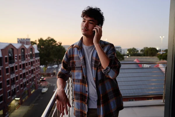 Young Multiracial Man Shirt Listening Mobile Phone Balcony Apartment Sunset — Stock Photo, Image