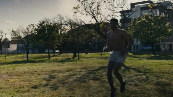 Shirtless Young Black Man Shorts Doing Intense High Knees Cardiovascular — Vídeo de Stock