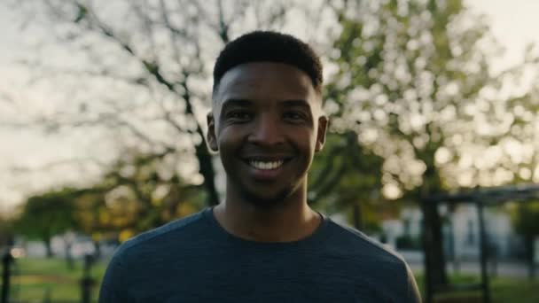 Portrait Young Black Man Smiling Looking Camera While Taking Break — Stockvideo