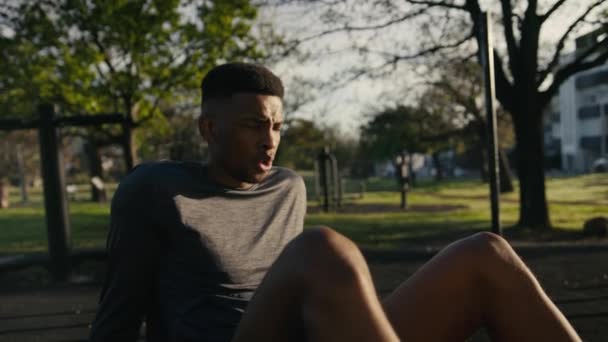 Young Black Man Sportswear Exhaling While Taking Break Exercise Trees — Stockvideo