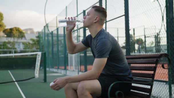 Young Biracial Man Sportswear Taking Break Drinking Water Tennis Practice — Video Stock