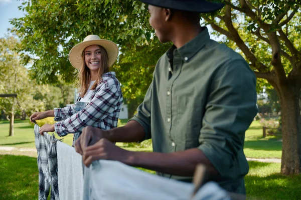 Mixed Race Male Female Farmers Hanging Out Washing Warm Summer — Stock Photo, Image