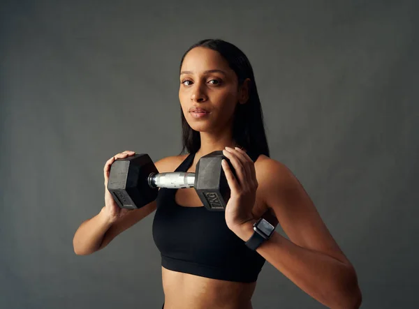 Portrait Young Biracial Woman Wearing Sports Bra Holding Dumbbell Studio — 图库照片