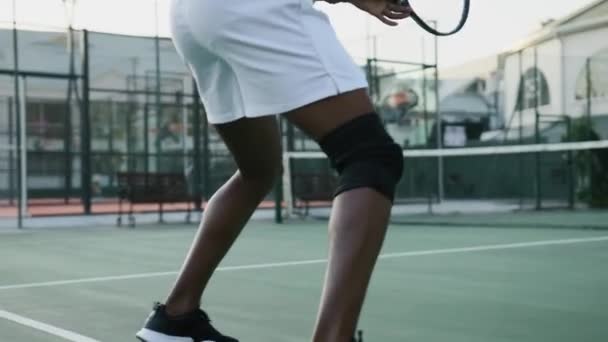 Close Young Black Man Wearing Sportswear Hitting Ball Tennis Racquet — 图库视频影像