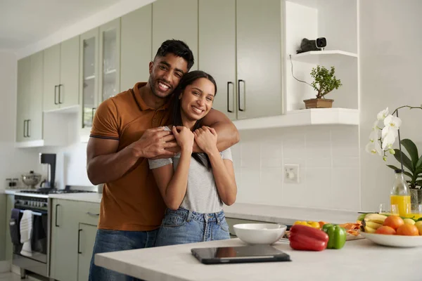 Happy Young Biracial Couple Smiling Embracing Next Food Digital Tablet — Stock Photo, Image