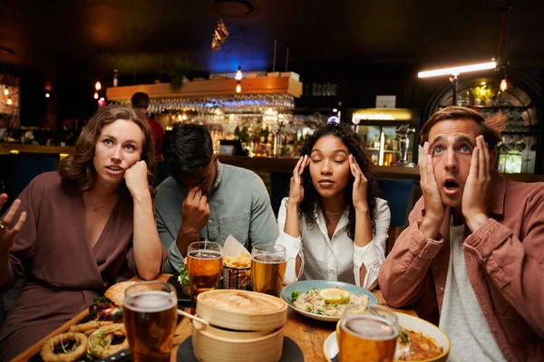 Frustrated Young Multiracial Group Friends Wearing Casual Clothing Enjoying Dinner — Stock Photo, Image