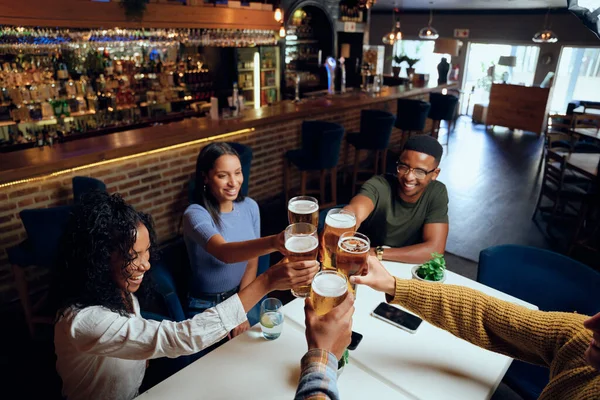Young Multiracial Group Friends Wearing Casual Clothing Toasting Beers Restaurant — Stock Photo, Image