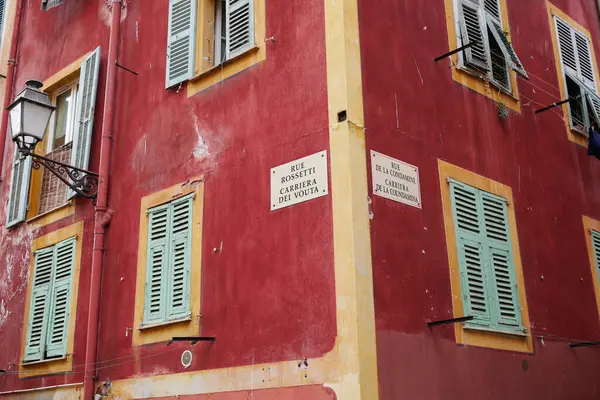 stock image Nice, France - May 23, 2022: typical building facades of Old Nice quartier, French Riviera.