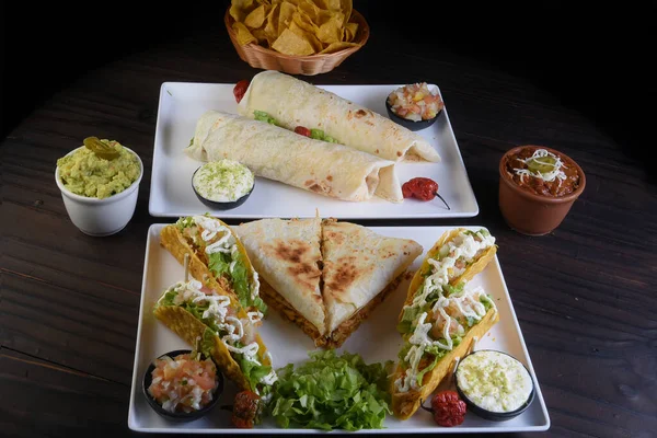 mexican tacos quesadillas and burritos with guacamole chilli salad jalapeno pepper typical tex mex cuisine