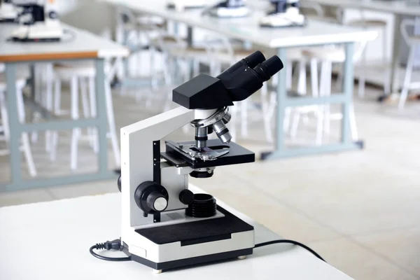 microscope is an optical instrument capable of enlarging images of very small objects, analyzing diseases clinical health research laboratory