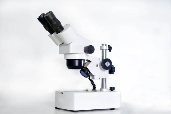 microscope is an optical instrument capable of enlarging images of very small objects, analyzing diseases clinical health research laboratory