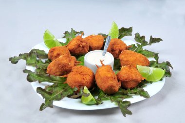 chicken Kiev chicken fillet stuffed with cheese and fried with salad and sauce