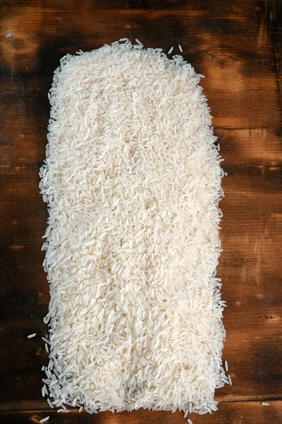 Beyaz Pirinç Doğal Uzun Pirinç Tahılı Ahşap Masa Üzerinde Doku — Stok fotoğraf