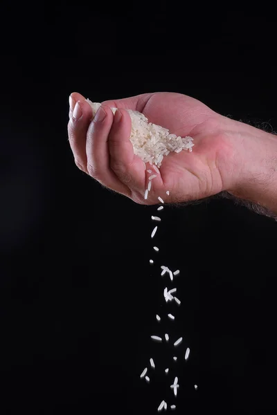 白米天然長米粒煮込み健康食品木のテーブル使用テクスチャ背景 — ストック写真