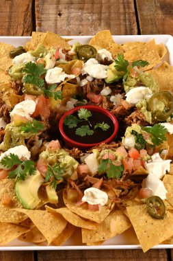 Meksika yemeği tacos guacamole jalapeno burritos quesadillas nacho tortilla tex-mex mutfağı baharatlı domates ve soğan