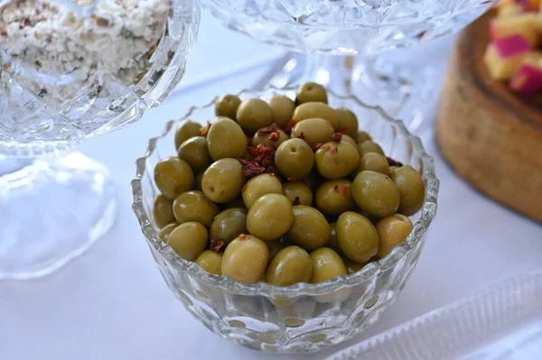 stock image olives seasoned with olive oil and dried tomatoes olive fruit vegan healthy food