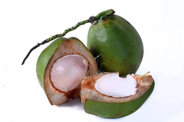 green coconut from Bahia Natural coconut juice tropical fruit in half fruit with tasty water on a white background