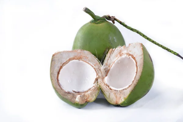 green coconut from Bahia Natural coconut juice tropical fruit in half fruit with tasty water on a white background