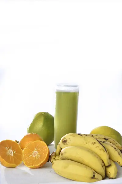 healthy natural fruit juice detox juice banana lemon orange vegan non-alcoholic
