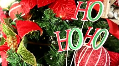 Noel süslemesi düzenlemeleri Noel Baba çiçekleri kar hediyeleri bulanık bölge bayram hediyeleri