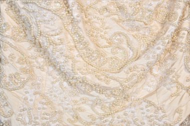 sarımsı bej kumaş buruşuk işlemeli kumaş desen arkaplanı ve metin arkaplanı için boşluk