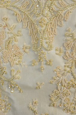 sarımsı bej kumaş buruşuk işlemeli kumaş desen arkaplanı ve metin arkaplanı için boşluk