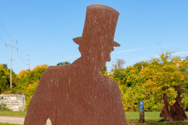 LaSalle, Illinois - United States - October 16th, 2022: Metal cutouts depicting historical figures at the historic I and M Canal in LaSalle, Illinois.