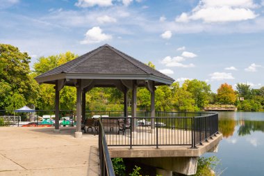 Gazebo at Riverwalk Park on a sunny Fall afternoon.  Naperville, Illinois, USA. clipart