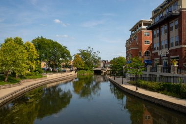 Naperville, Illinois- United States- September 15th, 2022: Riverwalk on the Dupage River in downtown Naperville, Illinois, USA.