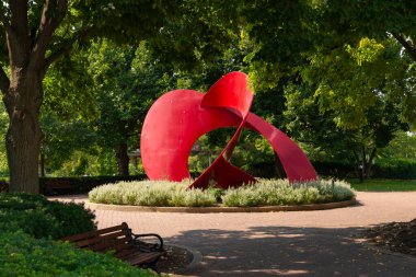 Naperville, Illinois - United States - September 15th, 2022: Landforms Sculpture by Jack Arnold on the Naperville Riverwalk.