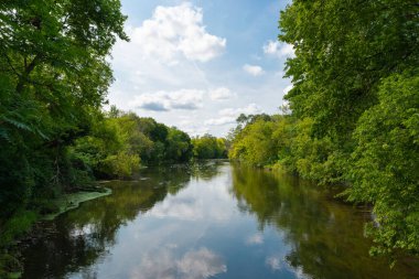 View up the Dupage River on a Fall afternoon.  Naperville, Illinois, USA.