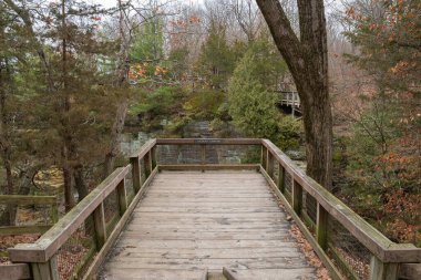 Wooden platform overlooking Wildcat Canyon on a cloudy Winter morning.  Starved Rock State Park, Illinois, USA.