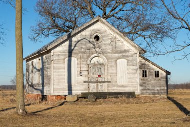 Old abandoned one-room schoolhouse in the Midwest.  Princeton, Illinois, USA.