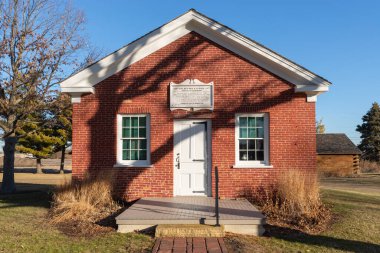 Princeton, Illinois - United States - February 13th, 2023: Exterior of the Red Brick School, originally built in 1850, in Princeton, Illinois.