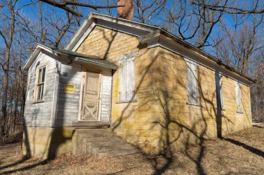 Old abandoned one-room schoolhouse in the Midwest.  Leaf River, Illinois, USA.