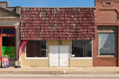 Seneca, Illinois - United States - February 20th, 2023: Exterior of old building and storefront in downtown Seneca, Illinois.