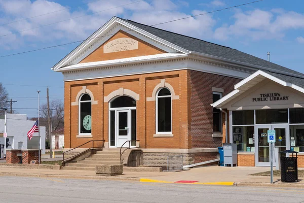 stock image Tiskilwa Illinois - United States - March 28th, 2023: Exterior of the historic Carnegie Library, built in 1908, on a Sunny Spring morning.