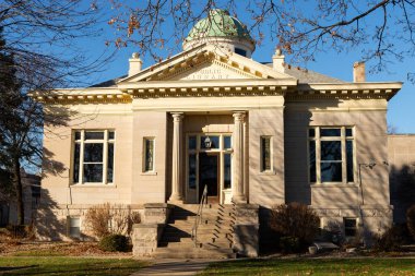 Mendota, Illinois - United States - December 7th, 2023: Exterior of the historic Hume-Carnegie Library, built in 1904, in downtown Mendota, Illinois.