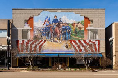 Ottawa, Illinois - United States - March 21st, 2024: Exterior of downtown building with W.H.L. Wallace mural by artist G. Byron Peck in Ottawa, Illinois, USA. clipart