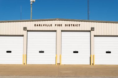 Earlville, Illinois - United States - April 8th, 2024: Exterior of the Earlville Fire District building in Earlville, Illinois, USA. clipart