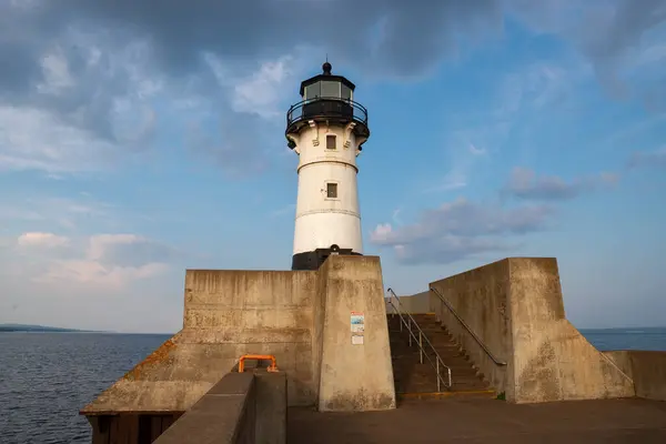 stock image Duluth, Minnesota - United States - August 12th, 2024: The Duluth North Pier Lighthouse, built in 1910, on a beautiful Summer afternoon in Duluth, Minnesota, USA.