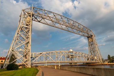 The historic Aerial Lift Bridge, originally built in 1905, on a sunny Summer afternoon in Duluth, Minnesota, USA. clipart