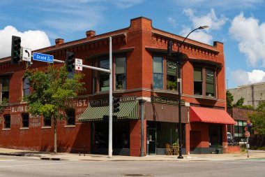 Des Moines, Iowa - United States - September 16th, 2024: Downtown building in the East Village on a sunny Summer afternoon. clipart