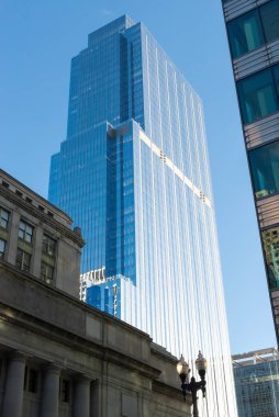 View of downtown buildings with blue skies from S. Canal Street in Chicago, Illinois, USA. clipart