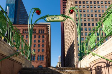 Chicago, Illinois - United States - January 13th, 2025: Entrance to the Metra on S. Michigan Ave. in downtown Chicago, Illinois, USA. clipart