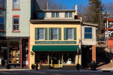 Galena, Illinois - United States - February 10th, 2025: Exterior of downtown building and storefront in Galena, Illinois, USA. clipart