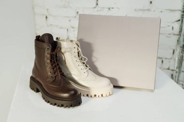 Women's leather boots in a branded box. NEW women's shoes